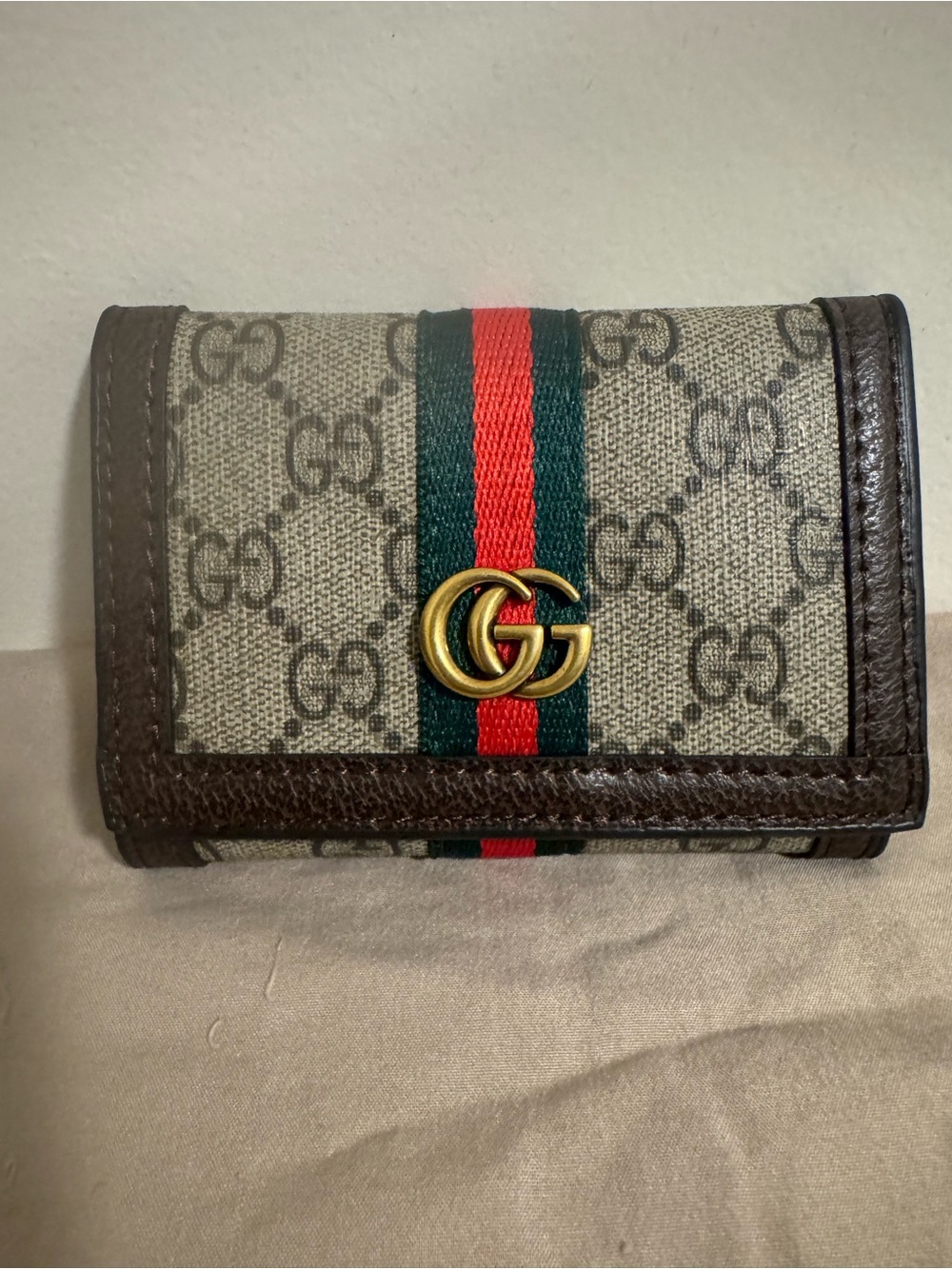 Gucci Black Leather Trifold Wallet with Gold Logo